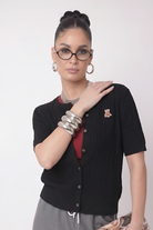 Cardigan Trecce Teddy nero|Colore:Nero